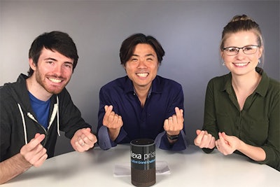 Dr. Jinho Choi (center) with graduate students who helped build the chatbot Emora.