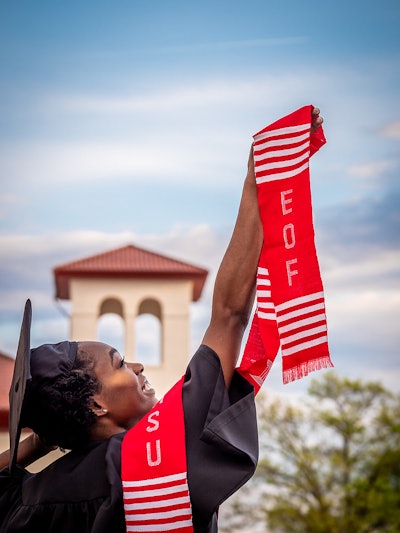 Education Opportunity Fund graduate wears her EOF stole with pride